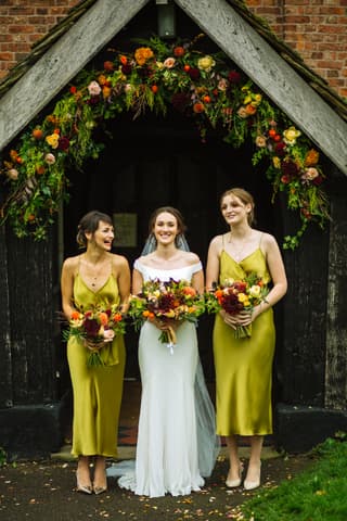 Image 1 of the wedding flowers for Georgina & David's wedding at All Saints, Siddington & Sandhole Oak Barn