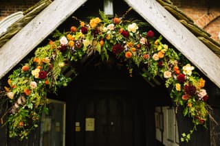 Image 3 of the wedding flowers for Georgina & David's wedding at All Saints, Siddington & Sandhole Oak Barn