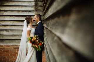 Image 8 of the wedding flowers for Georgina & David's wedding at All Saints, Siddington & Sandhole Oak Barn