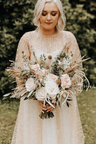 Image 1 of the wedding flowers for Kathryn & Jack's wedding at Oddfellows on the Park