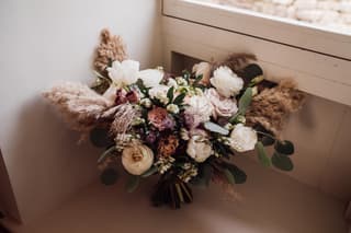 Image 0 of the wedding flowers for Katie & Jamie's wedding at The Ashes Wedding Barn