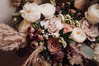 Image 1 of the wedding flowers for Katie & Jamie's wedding at The Ashes Wedding Barn